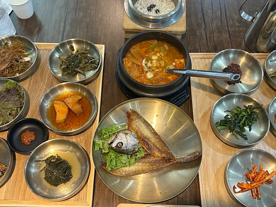 Full Korean set-meal spread with dried yellow corvina added