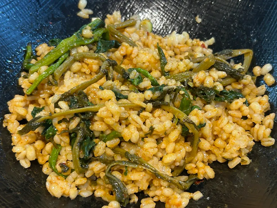 Close-up of cheonggukjang and side dishes