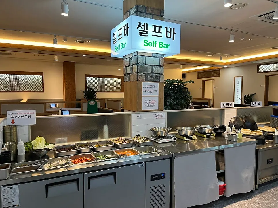 Self-service side dish corner at Gim Myeongju Tteuranchae Bapsang