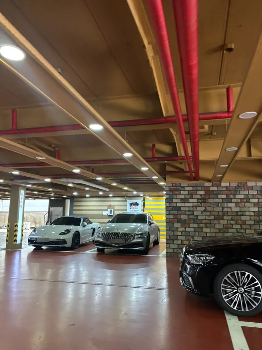 Cars entering the parking lot entrance