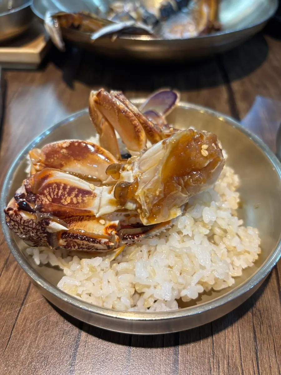 Soy-marinated crab served over white rice