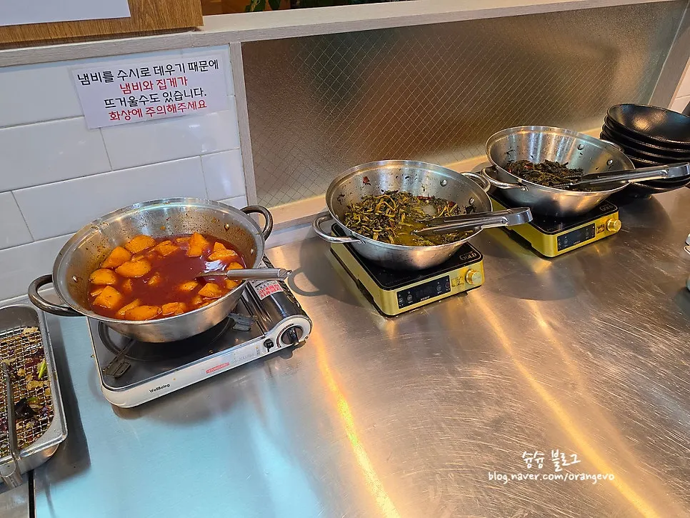 Salad bar corner with wrap greens and salad