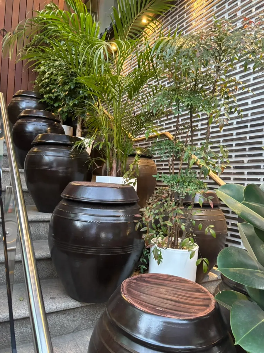 Decorated staircase leading up to the second-floor restaurant
