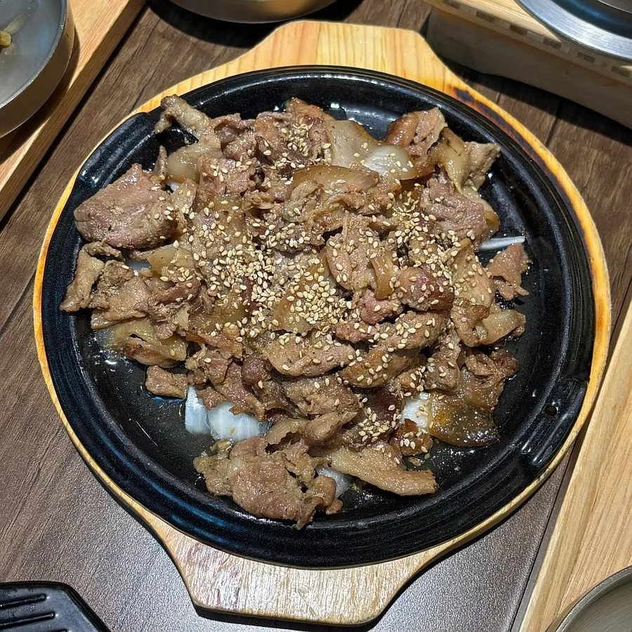 A plate of charcoal-grilled pork