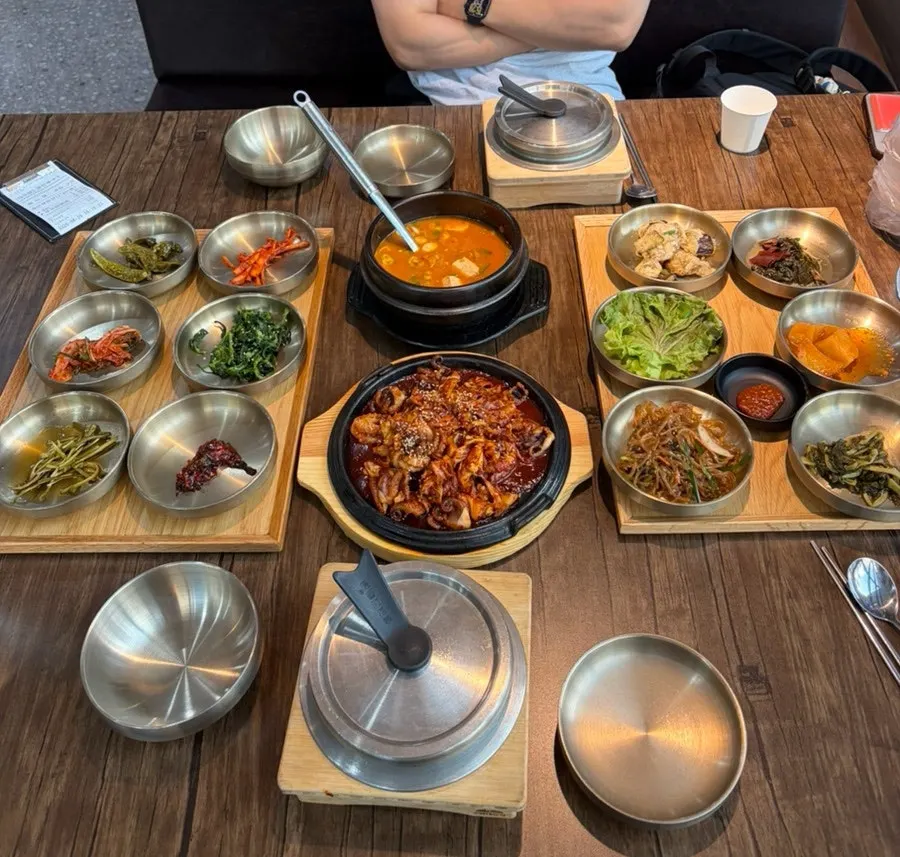A Korean set table spread with 12 side dishes