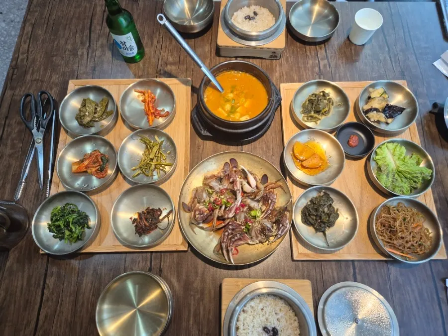 Wide shot of the meal table at the Bucheon Sinjung-dong Korean restaurant Gim Myeongju Tteuranchae Bapsang
