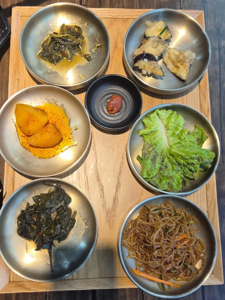 Tteuranchae Bapsang set with 12 side dishes laid out