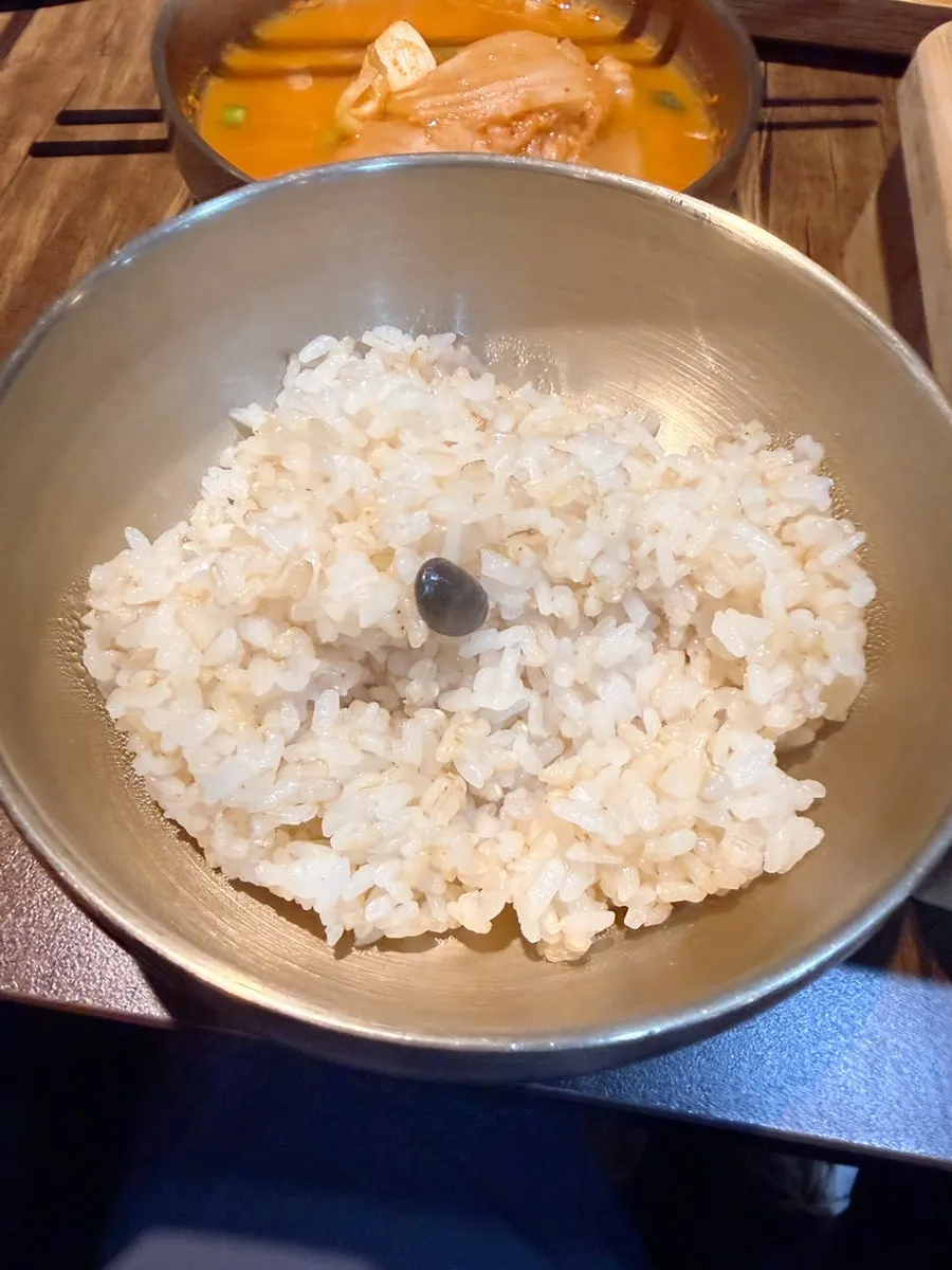Freshly cooked yellow-rice pressure pot rice