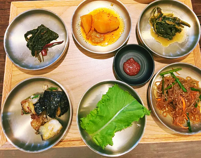 Plates of side dishes made with seasonal ingredients