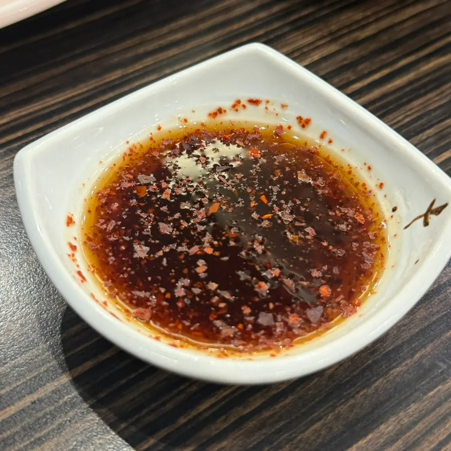 Cross-section of the sweet and sour pork with dipping sauce