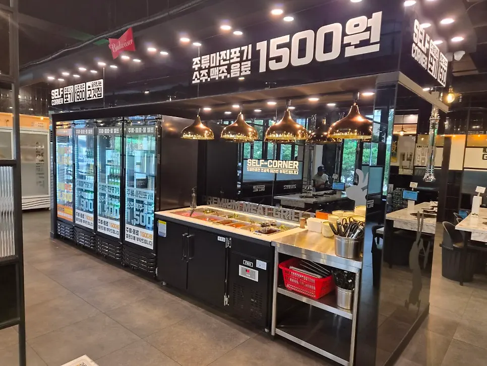 Sign showing soju and beer priced at ₩1,500