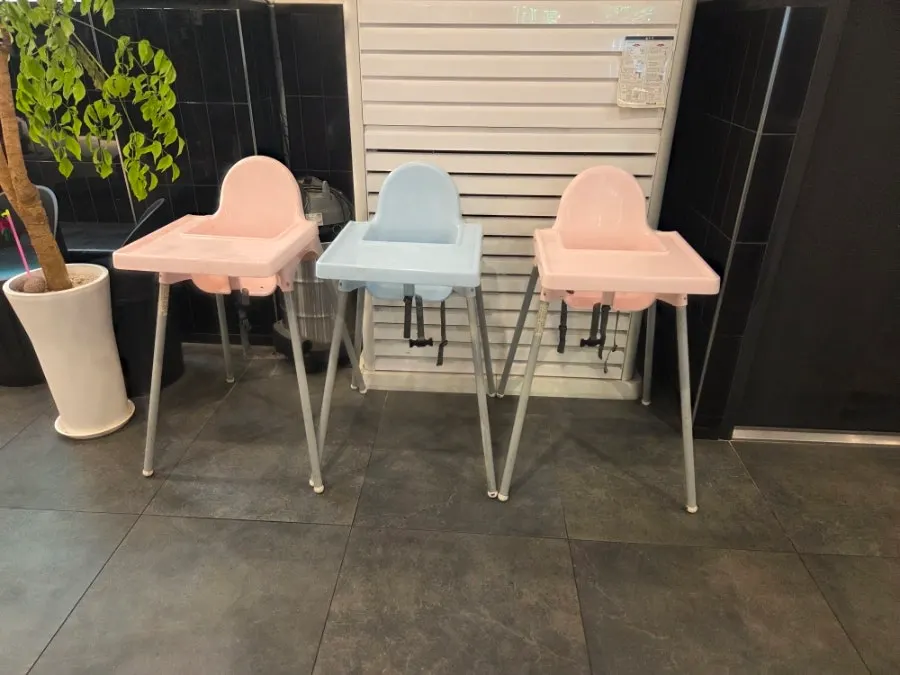 Interior of the BBQ restaurant with a high chair set out