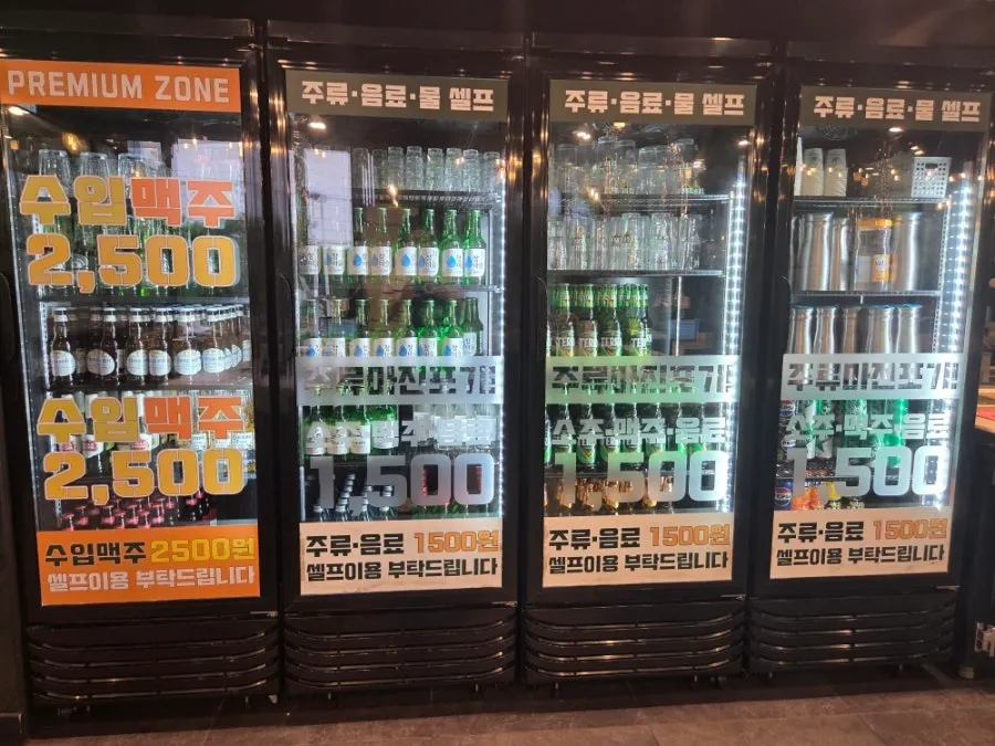 Self-serve bar stocked with lettuce, kimchi, and more