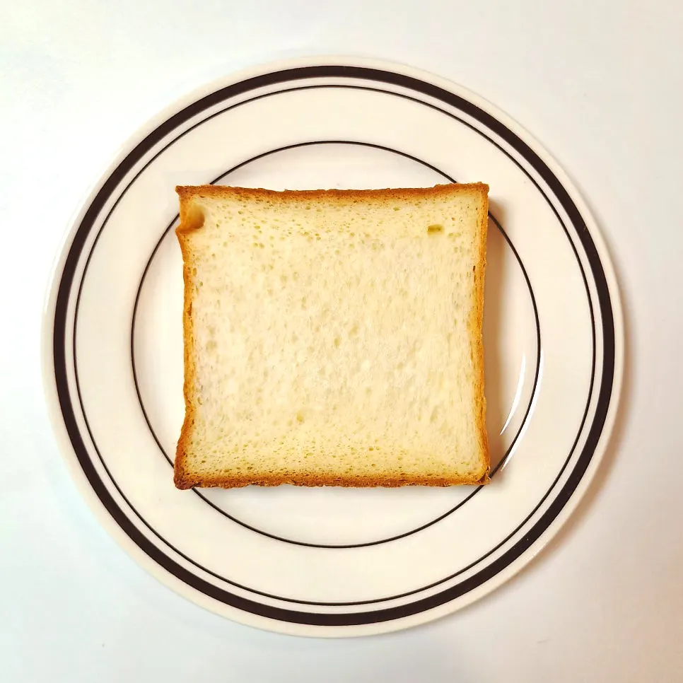 Golden Beurre milk bread torn apart by hand