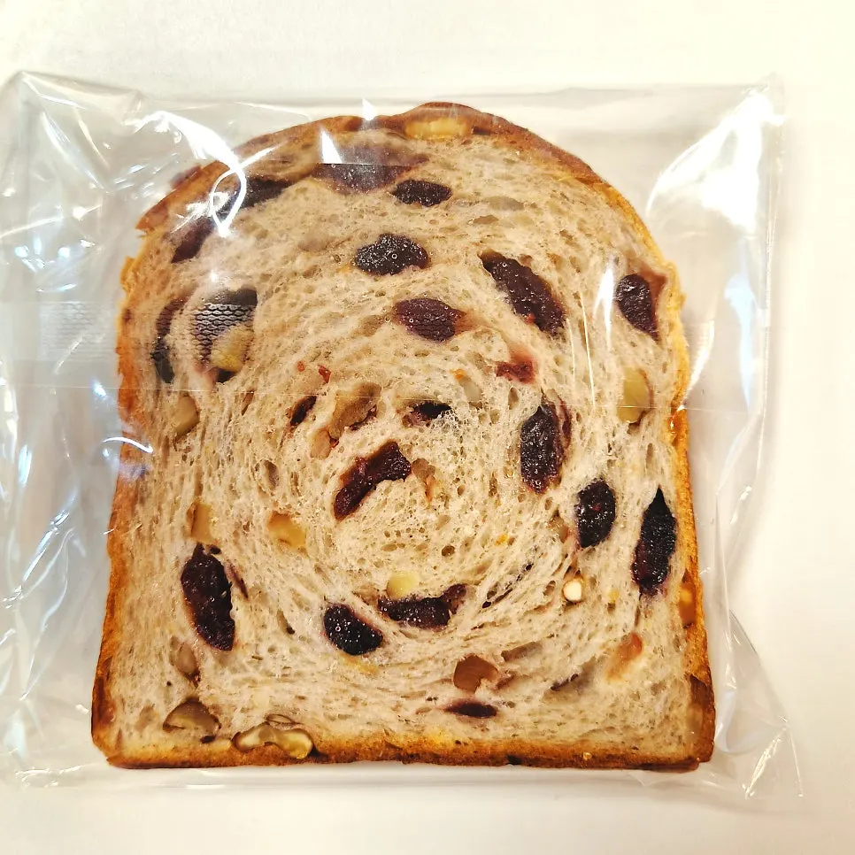 Cross-section of walnut cranberry rye milk bread
