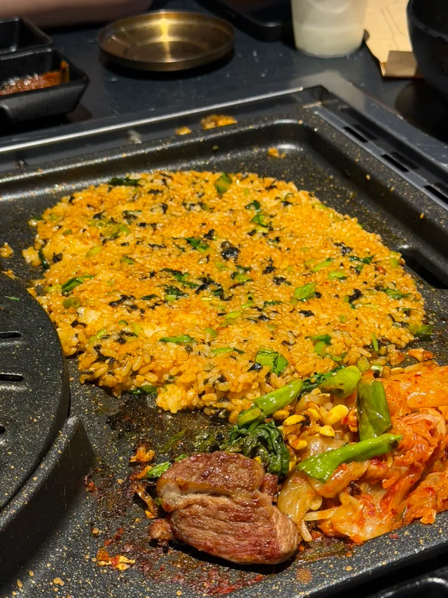 Meat and kimchi wrapped into the cold noodles