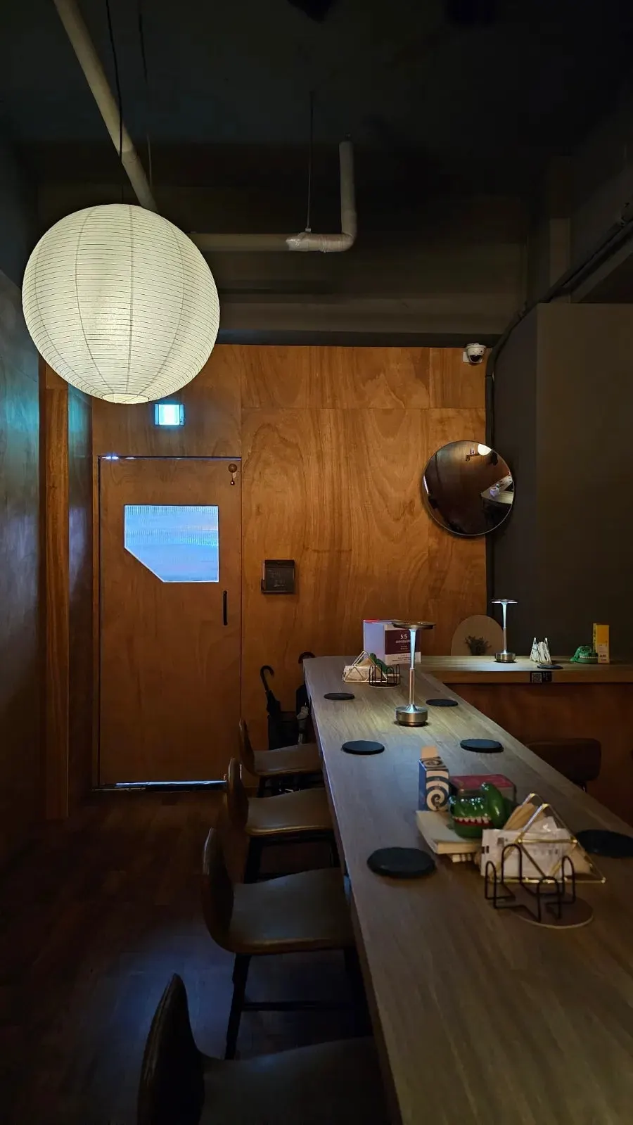 Long bar table set under soft lighting