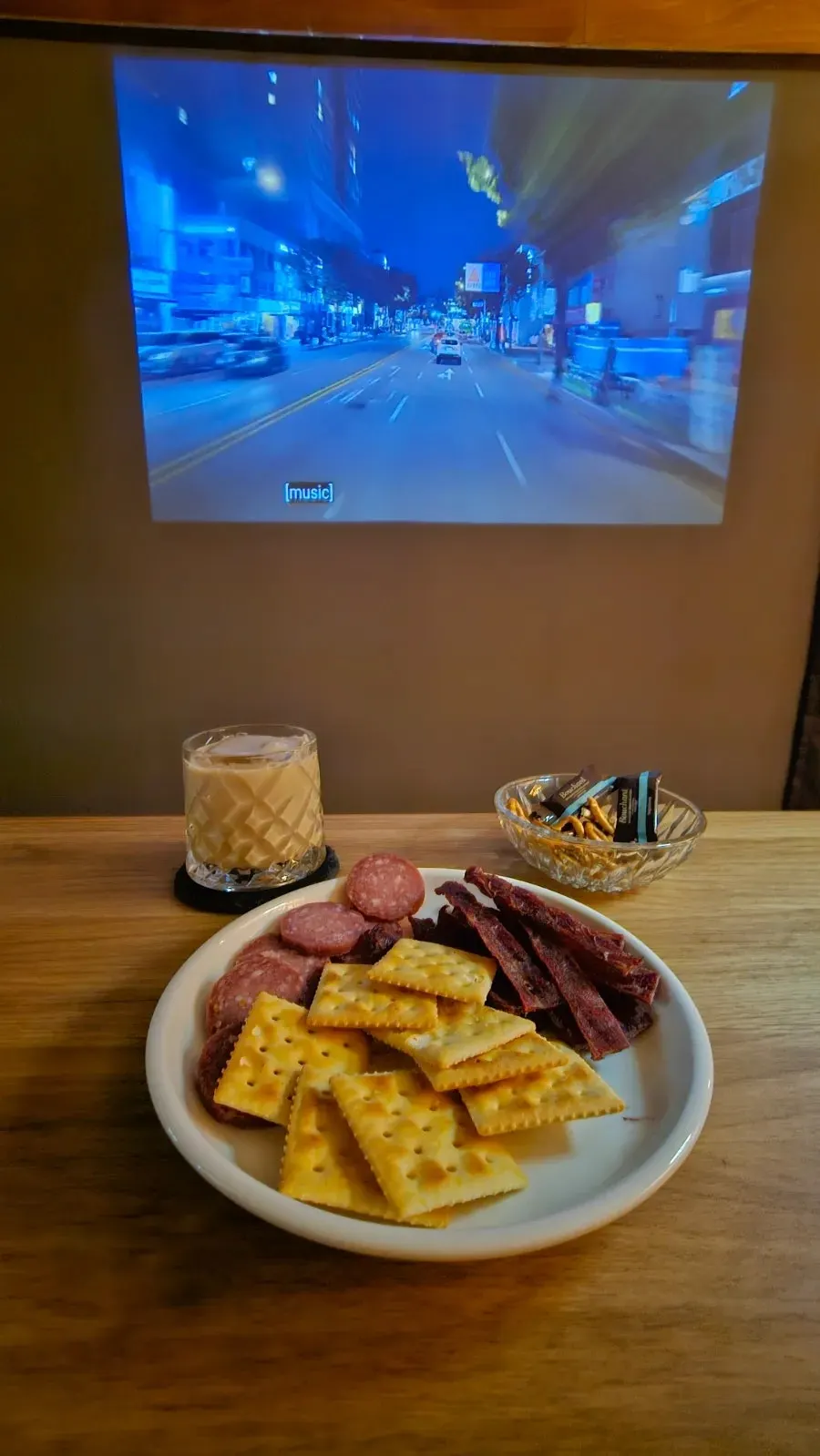 Road night-view video projected below the ceiling with the interior