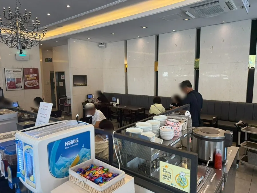 Restaurant interior packed with customers during lunchtime