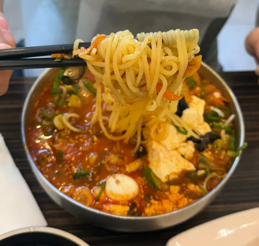 Noodles lifted up from the soft tofu jjamppong