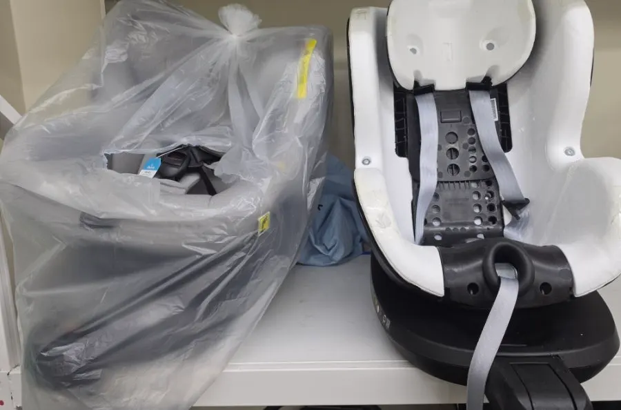 Strollers waiting to be washed on one side of the store