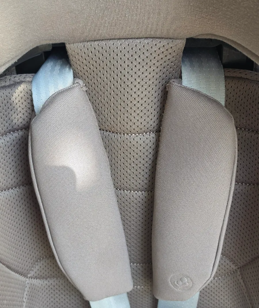 Side view of the car seat with fabric and frame managed