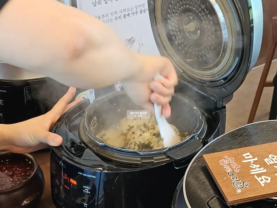 Cedar steamer and pot set up on the table