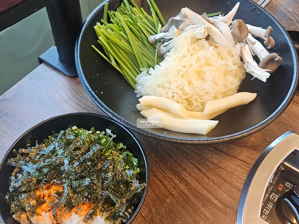 Vegetables and fried rice ingredients set up for the duck dori-tang
