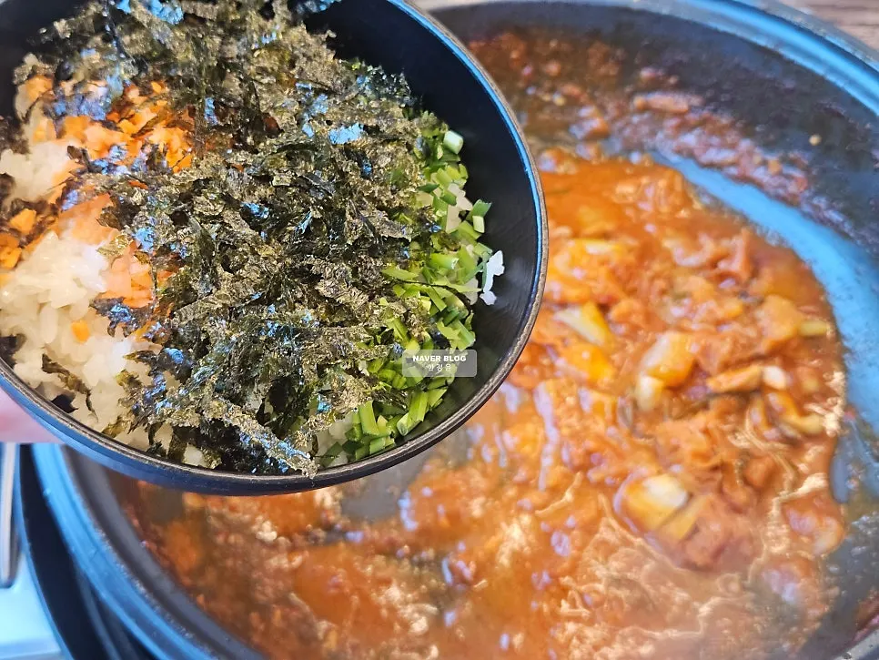 Fried rice ingredients added into the leftover dori-tang broth