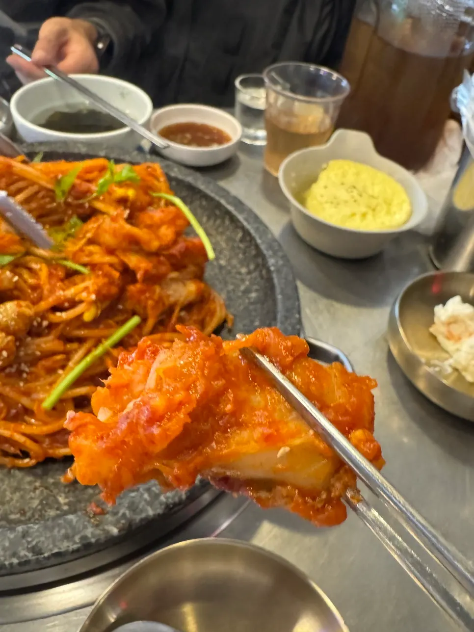 Chopsticks picking up boneless monkfish