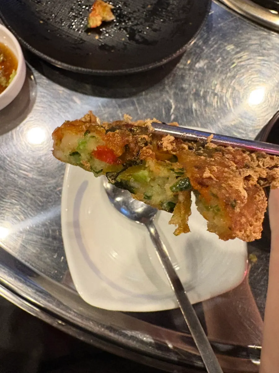 Close-up of the crispy fried seafood pancake