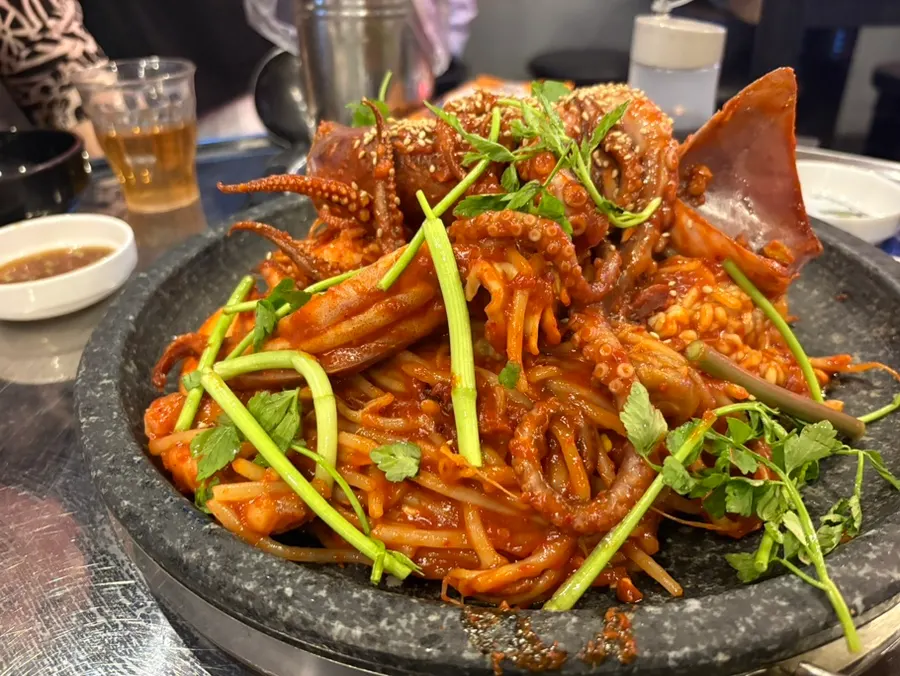 Hot-stone table set packed with seafood