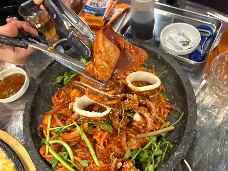 Whole squid topping the monkfish stew