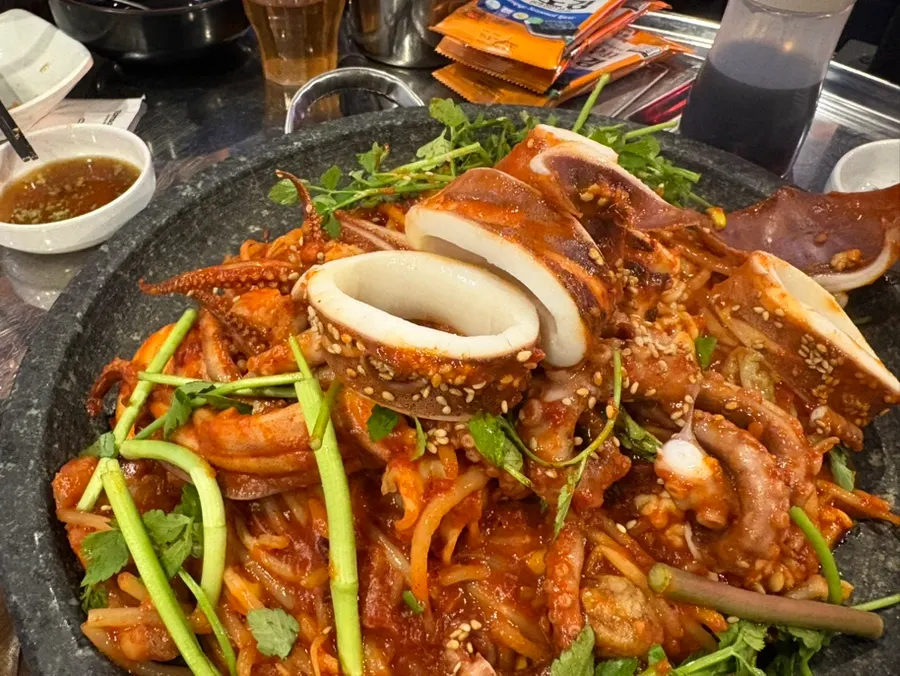 Hot stone piled high with fresh seafood