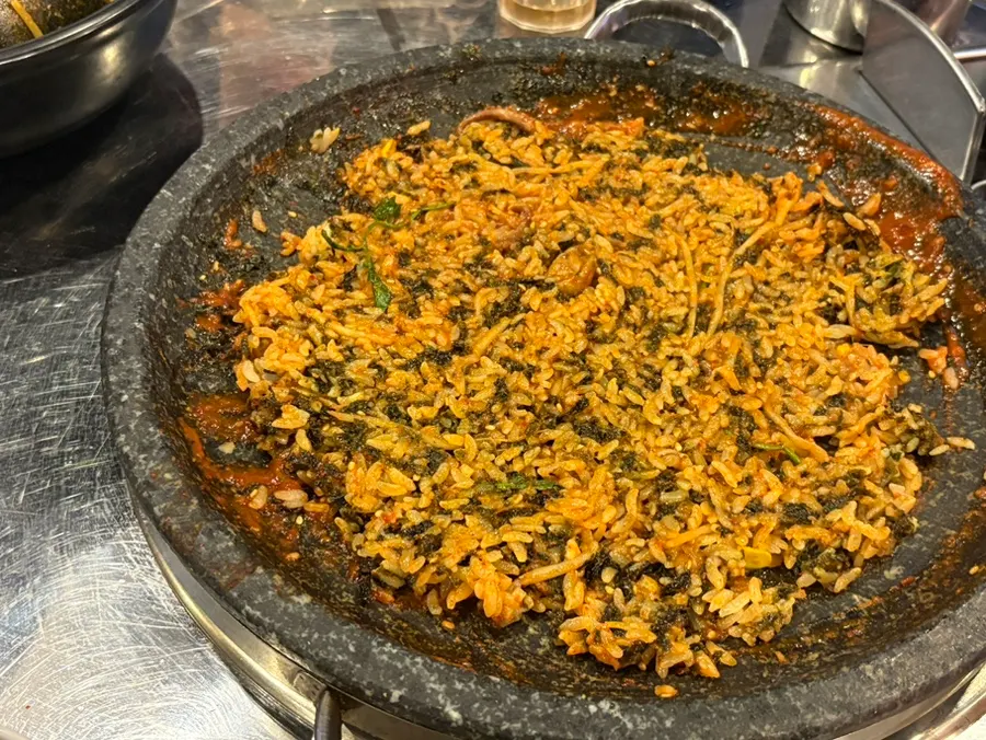 Hot stone being prepped for fried rice
