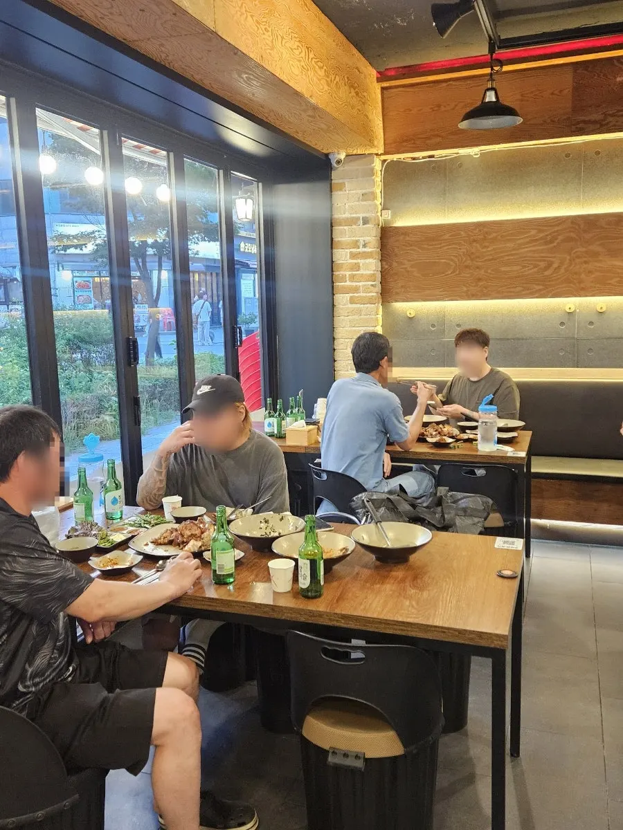 Interior mostly made up of 4-person tables