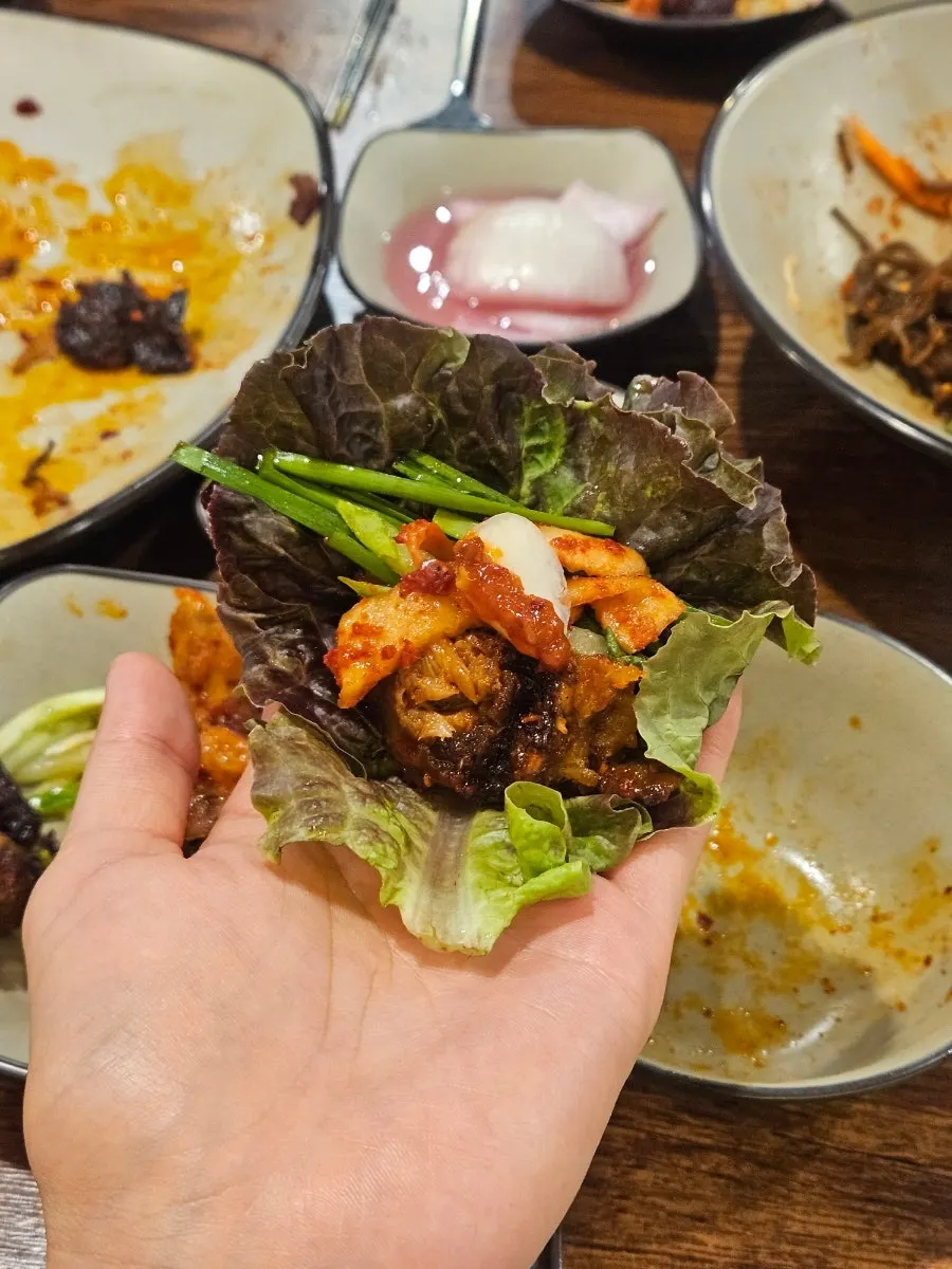 Jokbal and sides placed on a wrap leaf
