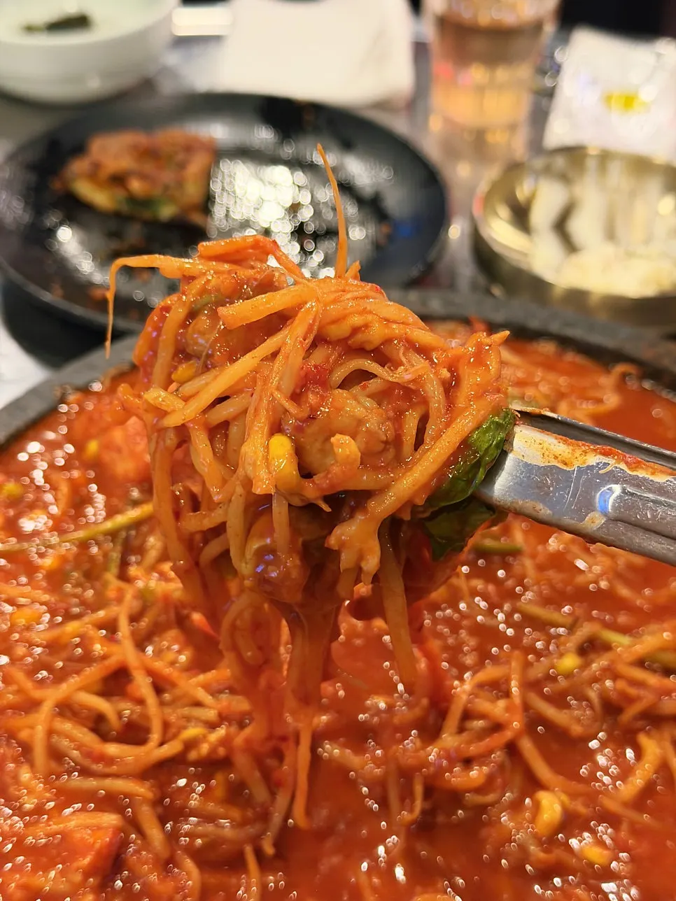 Bean sprouts and monkfish meat piled generously in the stew