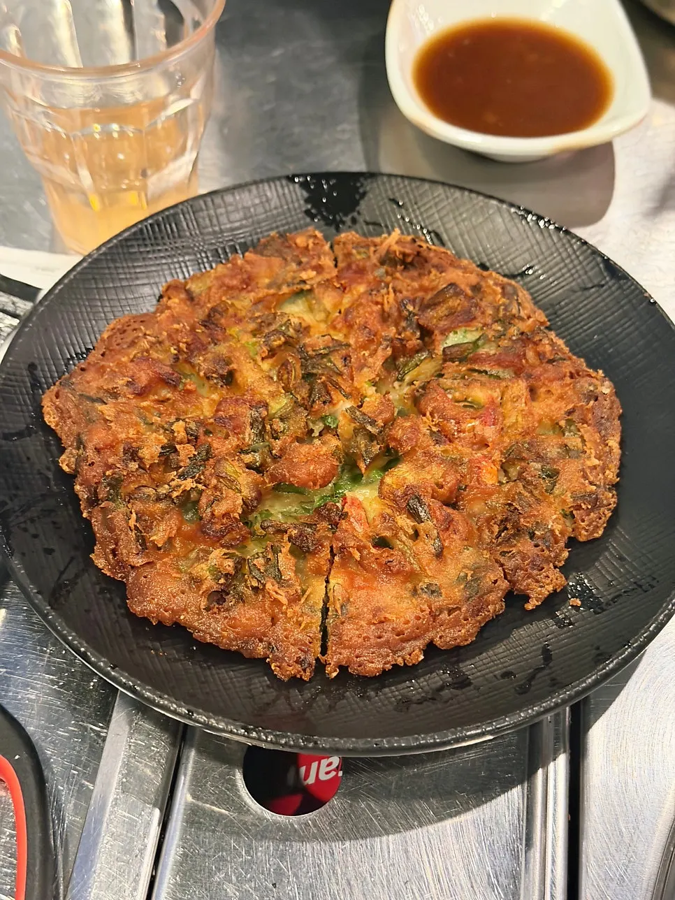 Seafood pancake and flat dumplings served alongside