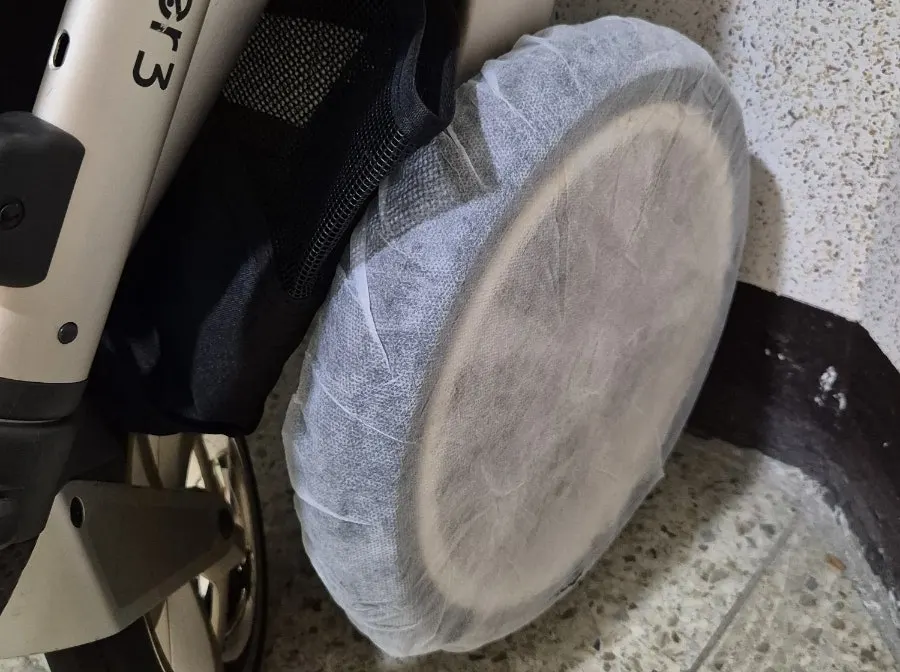 Stroller packaging with wheel protection covers