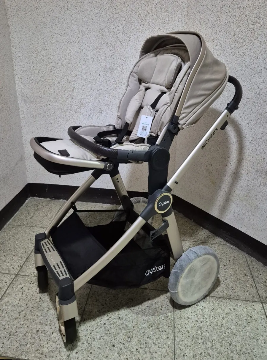 Neatly arranged beige stroller seat after cleaning