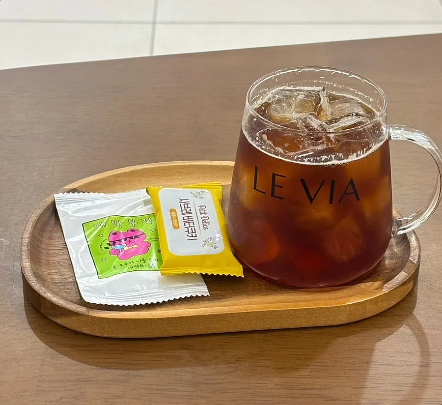 Iced coffee in a logo glass
