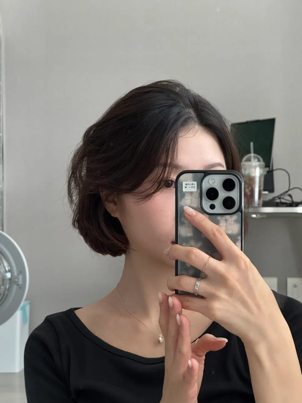 Natural bob curls swept over by hand