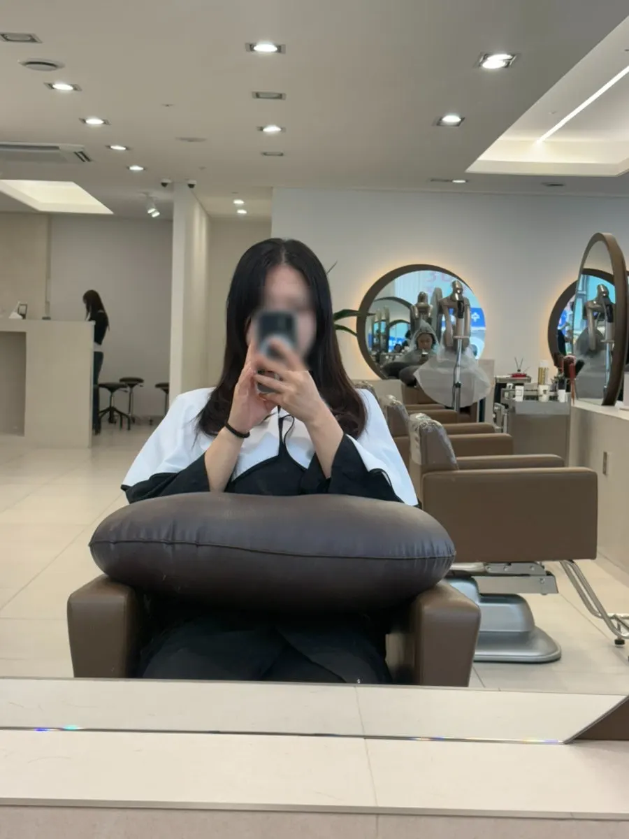 Hair being dried with a Dyson hair dryer