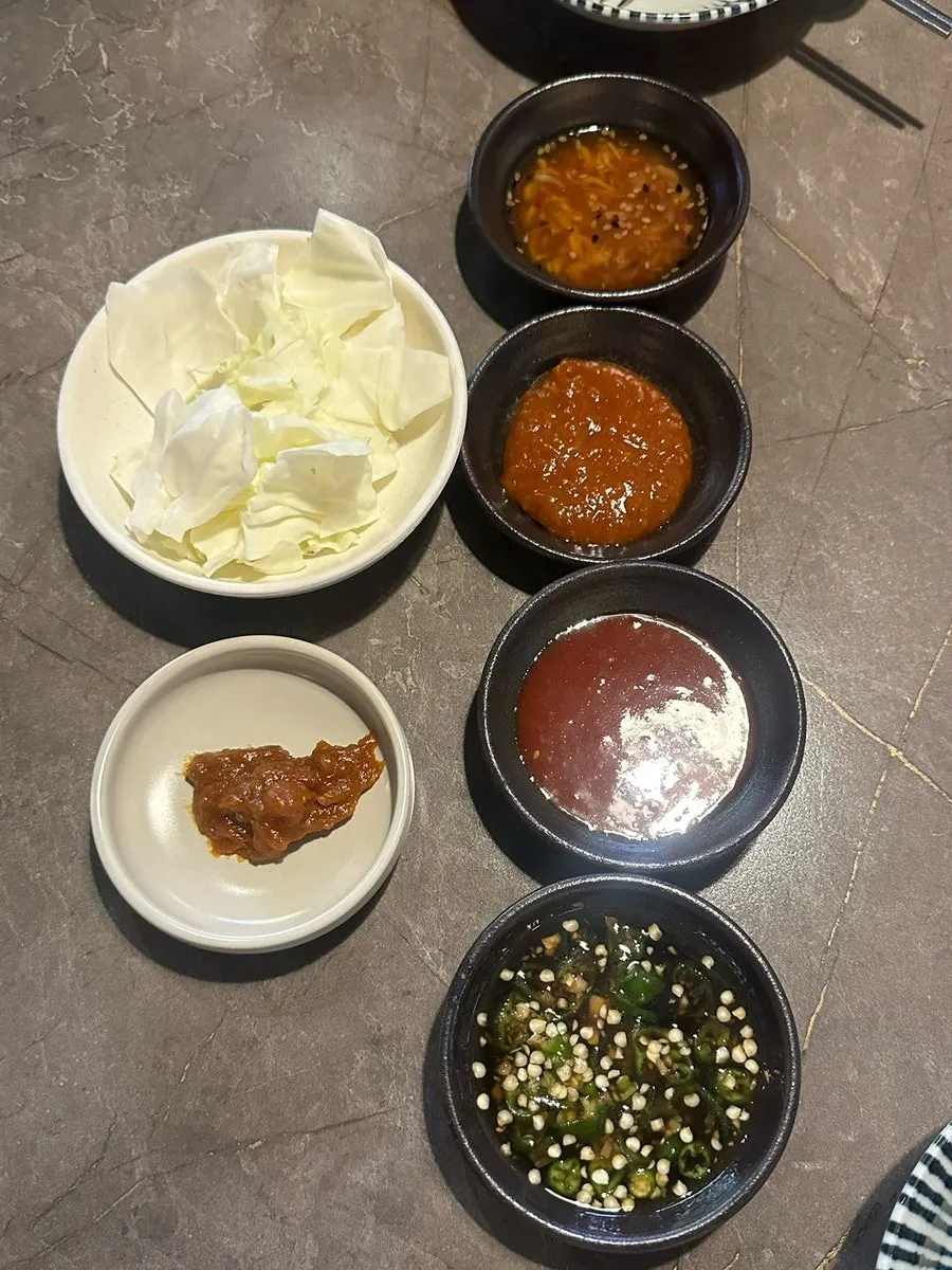 Salted shrimp, ssamjang, chili soy sauce, and chogochujang