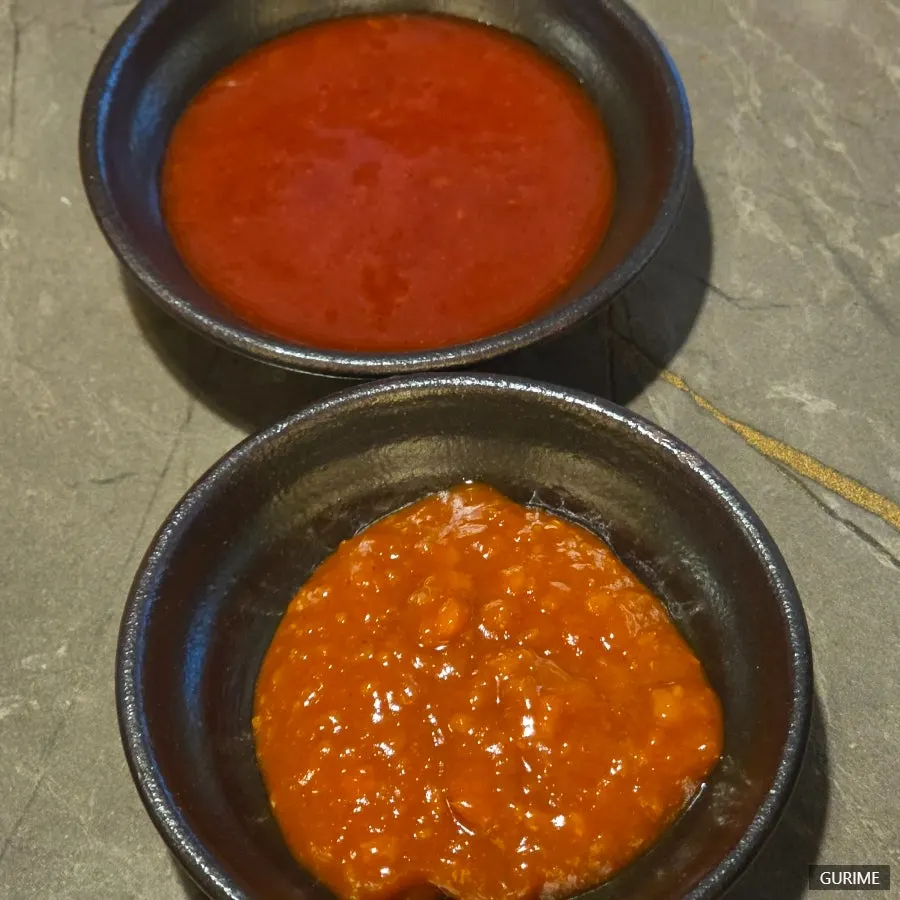 Plates of sauces served with each dish