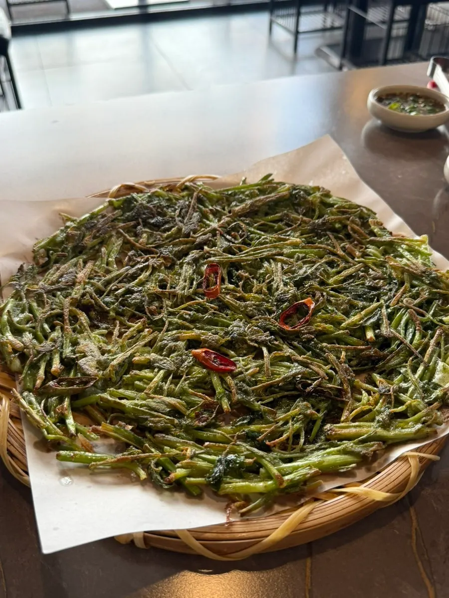 Minari pancake served first in the Buchigom set menu