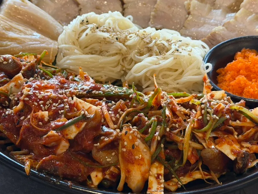 Buchigom's gulbaengi somyeon loaded with whelk