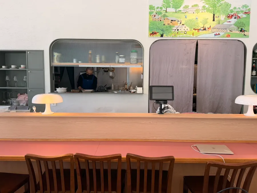 Bar seating near the kitchen at Bueokgan Suwan Branch