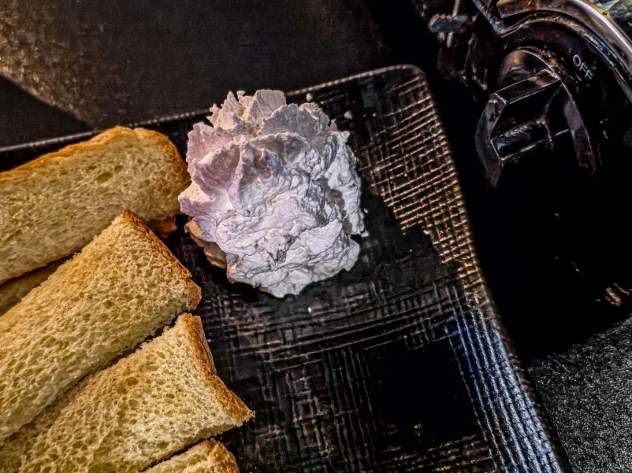 Crisp toast dipped in whipped cream